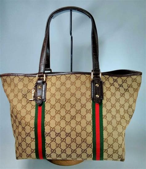 gucci bag with b buckle|authentic gucci canvas bag.